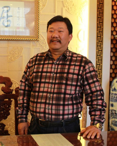 东阳明清居红木家具有限公司董事长金彪云